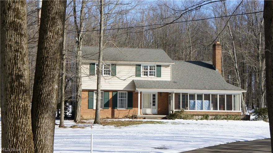 Nature Lovers Haven! This property has almost 17 ACRES of heavily wooded land located in Canfield School district, complete with picturesque pond and a Pole barn (currently used for wood-working). It would also be awesome storage for your extra toys or the perfect "Man Cave" The approx. 3000 sq ft home  features 4 bedrooms, 2.5 Baths, a large living room, a cozy den with brick fireplace and hardwood floors, a sunroom that overlooks "Golden Pond" and a finished basement. This home does need some TLC but is full of potential! If you love your privacy, water and woods....this home is for YOU!