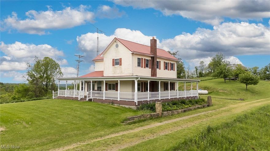Enjoy country living with modern comfort in this spacious farmhouse featuring a beautiful composite wrap-around porch perfect for relaxing or entertaining. The main floor includes a convenient laundry room and an open-concept living space. The home boasts 4 generously sized bedrooms and 4 full bathrooms, offering plenty of space for family and guests.

A 2-car attached garage provides ample parking and storage, with a large finished bonus room above — ideal as a game room, home office, or potential in-law suite. The property includes a small orchard and a shed, perfect for hobby farming or storage. Recent survey completed. Peaceful rural setting with room to grow and play!