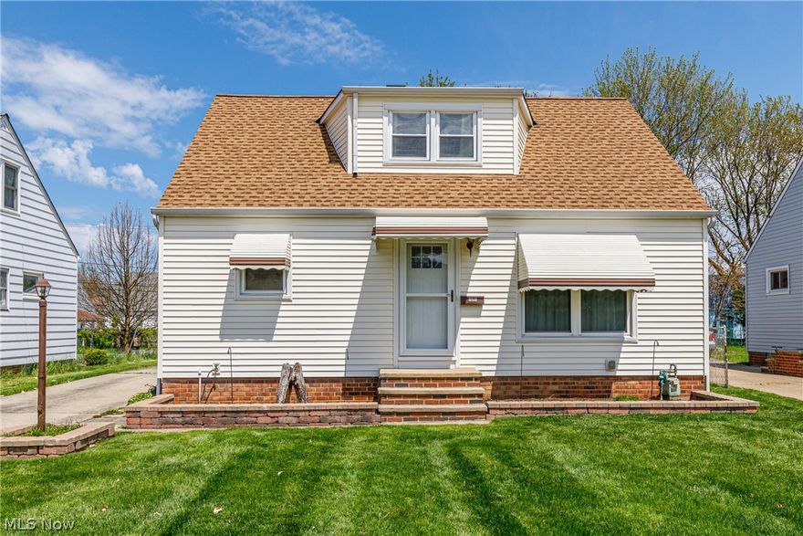 Pride of ownership abounds in this 3 bedroom bungalow with one bath and finished basement. The home has some very nice amenities. Nature Stone in three fourths of the basement. The basement has been waterproofed on all sides of the home. Insulation has been blown into the home and has reduced the utilitiy bills. The kitchen has been remodeled with new cabinets and laminate floor The appliances stay with the home. The bathroom has been redone by Rebath. The home has vinyl windows and glass block in the basement. The POS for the city has passed. The garage has electric. 
Close to shopping and Lake Erie and Dudley Park with a swimming pool and playground.