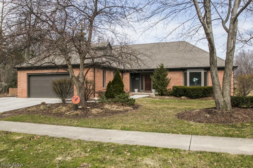 Magnificent custom designed home on a great street is certain to impress!  4 bedrooms & 3.5 baths.  Formal living room with hardwood floors.  Gourmet kitchen with cherry cabinets, granite counters, stainless appliances including Sub Zero refrigerator, island and ceramic floors... opens to newly renovated family & dining rooms with heated porcelain floors.  1st or 2nd floor master suites... both with their own private baths... so 1 bedroom down and 3 bedrooms up.  2nd floor attic storage.  1st floor laundry room.  1st floor half bath.  Newly finished basement with recreation room – 2012 with plenty of storage space.  Best of both worlds with hot water boiler heat and central air conditioning.  Newer windows (most) – 2013.  Concrete driveway – 2013.  Newer carpet & paint.  Exterior painted – 2014.  Large custom built outdoor patio / courtyard provides the perfect place to enjoy the outdoors.  Sprinkler system.  New storage shed - 2014.  Great location... walk to schools, Metro Parks and