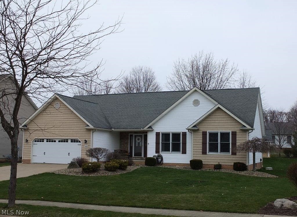 Beautifully updated 3/4 bedroom, 2.5 bath ranch with a finished lower level! New flooring throughout and new hot water tank in 2016 PLUS updated shaker siding in 2015! The gorgeous kitchen offers stainless steel appliances, a breakfast bar, tile backsplash and is open to the dining room. Spacious great room with vaulted ceilings. Enjoy the master suite with a walk-in closet and an updated, private full bath with tile flooring, granite countertops, vessel sink and tile surround! There are two additional bedrooms and a full bath with granite countertop, tile flooring and surround. First floor laundry and half bath - very convenient! Deep, oversized 2-car garage with new garage door. Finished lower level has a 37x12 rec room, great storage space and a bonus room that could make an excellent fourth bedroom! Backyard is complete with a large storage shed, a colored concrete patio, an aboveground pool and maintenance free deck (2016). A must see property - call today!