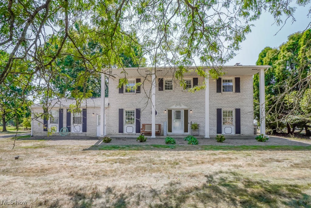You’ll feel right at home in this beautifully updated Colonial Revival on a half acre in Plain Local schools! A gas fireplace creates a welcoming focal point in the spacious living room, which flows into the dining room where sliding doors open to the patio for easy outdoor meals. The sunny kitchen comes fully applianced and offers plenty of cabinet and counter space for everyday cooking and entertaining. The main level also includes a family room/den and a convenient half bath, with hardwood floors under the carpet in much of this level. Upstairs, four comfortable bedrooms with large closets share two full baths, including a primary suite with a walk in closet and a private bath with a tiled step in shower. The finished lower level adds even more space with a rec room ready for game nights or movie marathons. Outside, the level yard gives kids and pets room to play, and the two car rear load garage is great for parking and extra storage for lawn tools, toys, and more. Updates include a newer roof, fresh paint, carpet, lighting, garage door and opener, electric panel, and a sump pump with battery backup. Come take a tour and see everything this home has to offer!