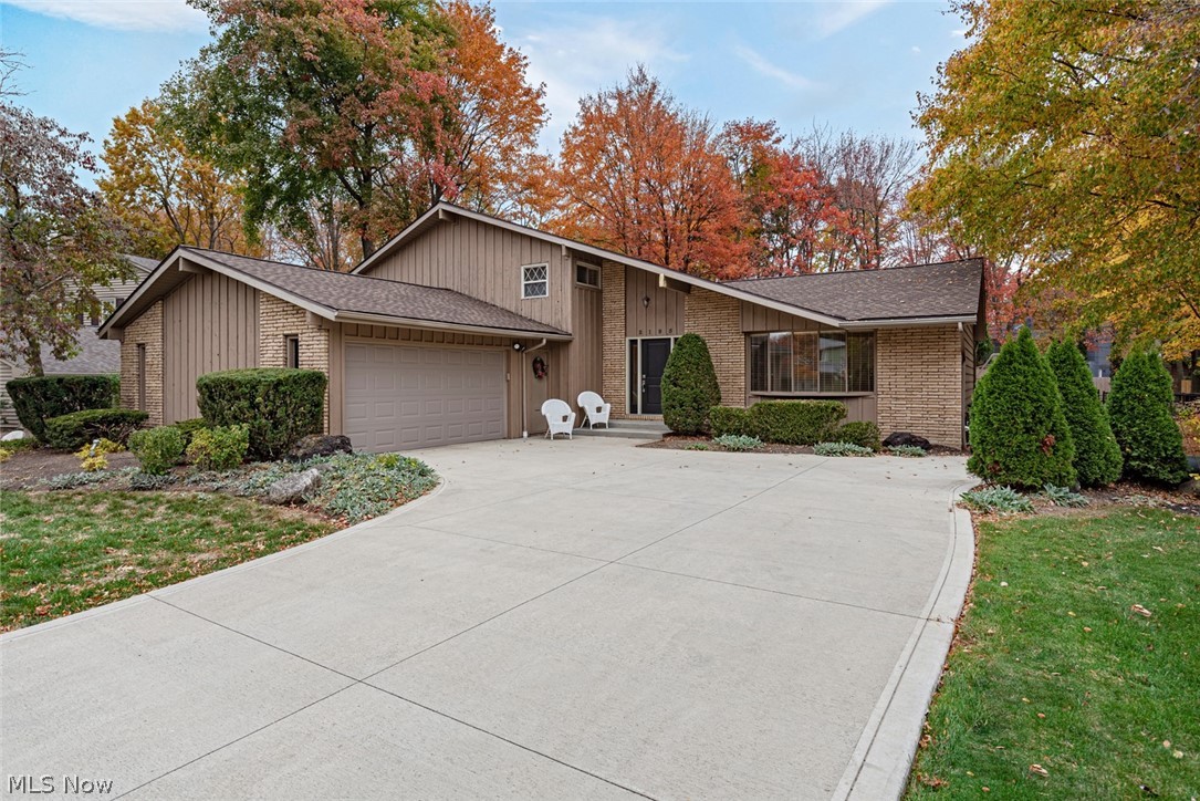 Move right in to this beautiful split level home situated close to everything you need in Westlake! This home features an open floor plan, a lovely eat-in kitchen, and a fully fenced-in backyard. All it needs is you! The open living/dining room flows into the kitchen, which boasts gorgeous granite counters, a full complement of stainless steel appliances, and a sunny eat-in area with deck access. Step down to the spacious family room, which features a weeping mortar brick fireplace and sliding doors to the back patio. A convenient laundry room, a half bath, and a bonus room perfect for an office or playroom round off the first floor. Upstairs, you will find three large bedrooms, including the master suite with an en suite bath and a walk-in closet. An additional full bath completes the second floor. The lower level is partially finished and is perfect for a recreation room or a family/media room. Outside, you are sure to enjoy relaxing on the deck or patio, which overlook a large fenced-in backyard with an above ground pool! Located off of Hilliard Boulevard, this home is just minutes away from shopping and dining destinations at Crocker Park, very convenient to area schools and I-90. Do not wait to fall in love with this charming home!