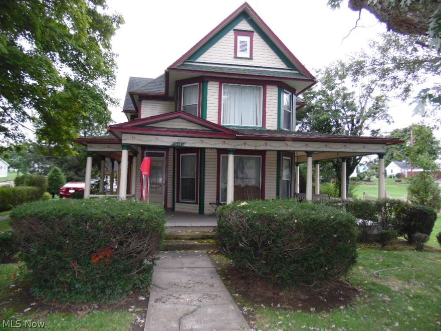 What an opportunity to own a piece of history! This turn of the century home is listed in the archives of The Ohio Historical Society. This classy house is looking for an owner to enhance its original character of days gone by. Conveniently located outside of a small village, it features 5 bedrooms, 2 full baths, a dining room, living room, main floor laundry; and these are just a few of its attributes. Three parcels make up the property as well as a three car garage. A buyer would be lucky to have this house and turn it into a home again.