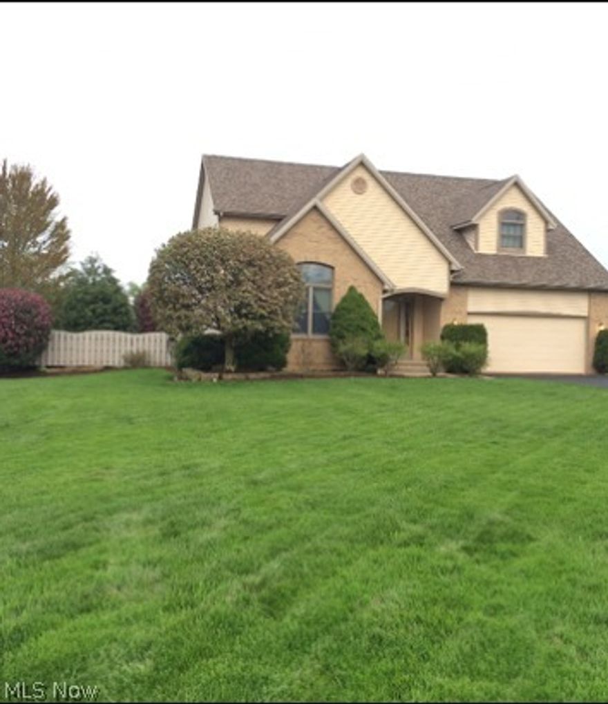 This wonderful home offers many Great features! Sitting on over an acre lot, this home has privacy galore. Sitting on the back deck with the new canvas awning you can enjoy countless relaxing hours or many days entertaining not only on the deck but in the large and meticulously landscaped yard. Rounding out the outside is a detached 2 car garage that has a large work area also and also has its own drive way. Heading into the home you are warmly greeted by a neutral 2 story foyer that has been freshly painted, w/a large dining room to the left and straight ahead into a neutral eat-in kitchen with all appliances staying (stove & dishwasher - 2015) Off the kitchen you step down into a family room with fireplace flanked by 2 windows looking into the scenic back-yard
upstairs is a huge master bedroom with master bath and 2 more bedrooms and a bath. Rounding out the home  is a 1st floor laundry room and a finished basement (sq ft not included in actual sq footage).