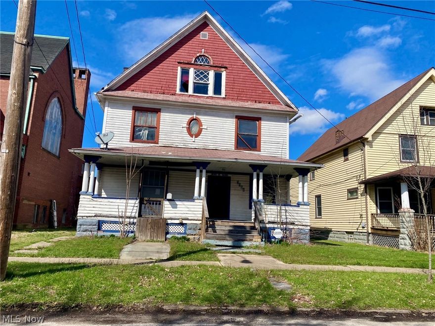 This home can be used for a double, a home for a large family, or a group home. Located .3 miles from  Metro Health Main Campus Medical Center., it offers an easy commute for employees working there. It needs some TLC, but it has great bones and is brimming with architectural features such as a stunning staircase and dark wood trim throughout.  It features hardwood floors. The Fire place, which is currently non-functioning, has an ornate surround with dark woods, a mirror and tile inlay.  There are pocket doors on the first floor to several rooms. As a double it offers 3 bedrooms on the first floor and four on the second floor.  The unfinished attic offers a large space that could be converted for additional living space.  The basement is dry. It just needs some TLC to restore it to its original grandeur.