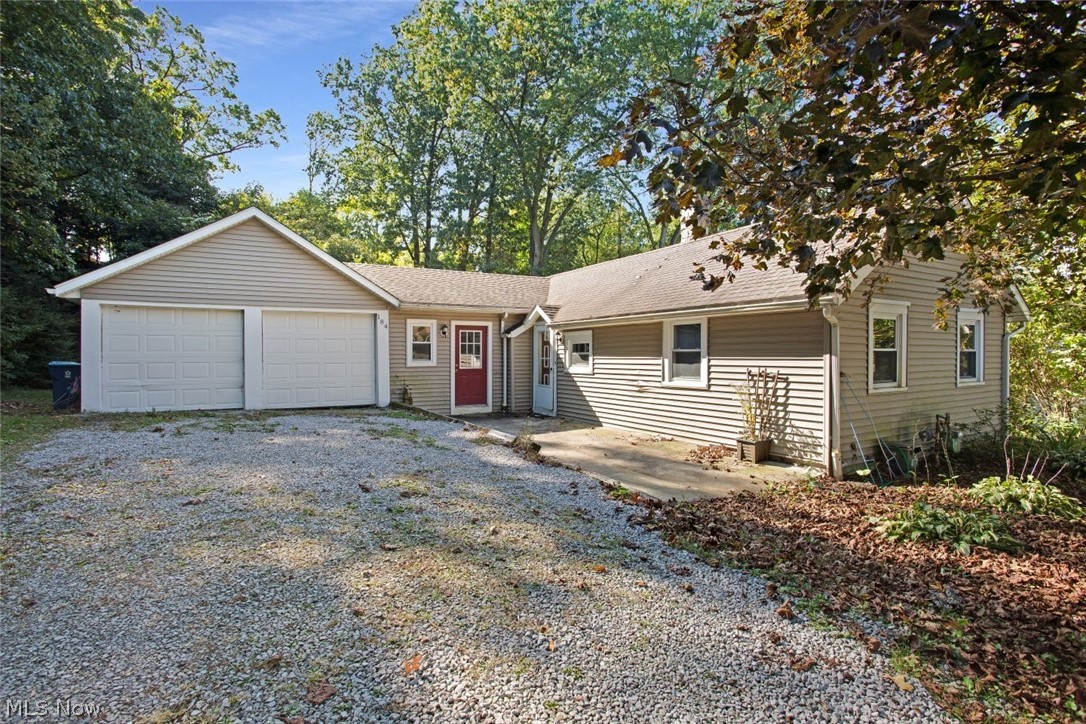 Welcome to 184 Olivet Ave, Akron, OH. This 3 bed 2 bath home features 1,452 square feet of living space for you or your family. Have you been wanting to live in the heart of Portage Lakes? This is it! Portage Lakes is one of the best places to live and enjoy life here in Northeast Ohio. 411-acre Portage Lakes State Park offers locals and residents a variety of outdoor recreational experiences. Boating, swimming and fishing are popular on the several surrounding lakes. The wetlands of the park attract waterfowl and shorebirds providing enjoyment whether hunting or observing wildlife. With this home you have access to all of that and so much more. Some additional features of this home include the spacious living area which you do not normally find in these lake style homes, 2 car attached garage, the partially finished basement and the back patio. In the partially finished basement you will also find a half bath too. Like mentioned previously the basement walks out to the patio for your