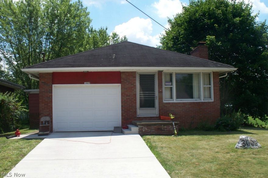 Take the time to see this brick ranch in move-in condition on a double lot.  Very spacious living room with fireplace, central air, kitchen/dinette area, 3 bedrooms and bath on first foor.  Basement has fireplace with a semi-finished rec room and half bath.  Attached garage, new concrete drive.  To see call for an appointment. Parcel #53-223-0-785.00-0 also included with sale.