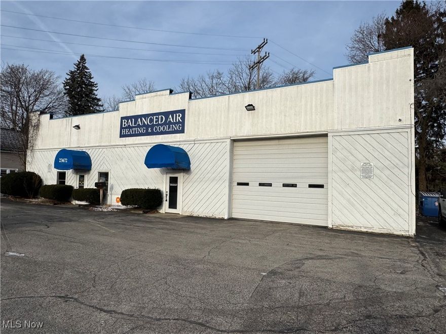 Industrial building is perfect place of business for someone needing both office and garage space with a 12 ft overhead door..  Newly renovated office space and a newer Reznor heating unit added in the garage.