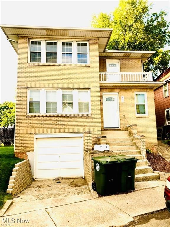 Brick duplex with (2) 1 bedroom units each have dining room, living room, bedroom, kitchen, and bonus room. Tenants have utilized the space in various ways. Newer vinyl windows (July 2022) in most of building, previous vinyl before that on most. New roof in 2021. New carpet in 2021. New flooring in upper kitchen in 2022. There is a driveway and a garage. Basement has 2 separate areas for laundry hook-up. There are common areas in front and back and an attic as well. Both units rented currently rented. Walk into your new investment with all of the work done!