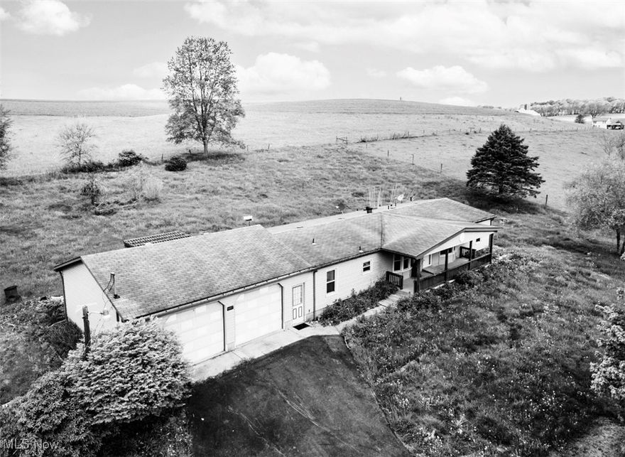 Welcome to the country. Kick back and relax on 1.3 acres enjoy the breathtaking views of the pastures that surround you. This 3 bedroom home has loads of potential large family room and spacious bedrooms. This manufactured home sits on foundation with a massive basement that is a blank slate for additional game room, gym  home office or what ever you may dream of.  A nice two car attached garage is an added convince for carrying groceries into the house on those rainy days. The master bedroom offers plenty of space with double closet and master suite bathroom with large whirlpool tub. No need to truck all the laundry down the steps this home also offers first floor laundry with washer and dryer hook ups. Don’t forget about the lovely covered front porch and the peaceful back deck. Massive amounts of possibilities for this country home located in United Local School District make your dreams come true today.