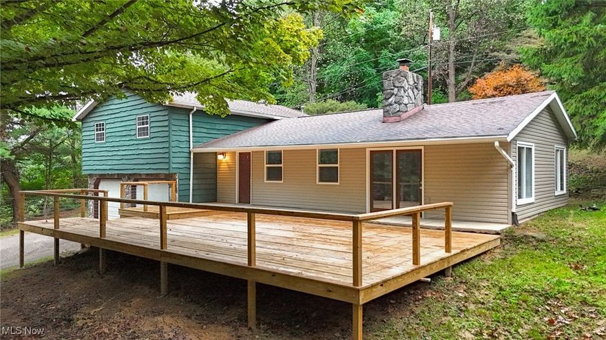 Can you say... WOW! This home has it all, starting with its private location. Offering an oversized two-car attached garage and new large modern decks. Come inside to find a whole house remodel. Starting in the living room with the new floors, paint, and updated fireplace, which opens into a large kitchen, with new backsplash, concrete counters, and built-in stainless-steel appliances with an abundance of cabinets. The oversized sunroom features new windows and tile floors. On the next level, you will find three bedrooms and a full tile bath. The master suite is a show stopper with its recessed lighting, vaulted ceilings, new carpet, and patio doors that lead you out onto the private deck. The master bathroom has been redone offering porcelain tile floors, a double vanity, shower, and bath combo. Newer HVAC system all within the last 3-4 years. Nothing in this home has been left untouched.  All this in the Williamstown school district. Call to schedule your showing today!