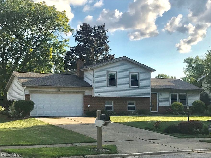 This beautifully kept and updated vinyl-clad Tri-level is as turn-key ready as they come! From superb curb appeal to porcelain tile to newer windows and MUCH, MUCH MORE... this is the FISH that absolutely cannot get away! All told, over $100K of improvements made to this property since purchased in 2003... WOW. Centrally located near Routes 8, 59, 91, & 303--it's 35 mins to downtown CLE & 20 mins to AKR. Anything you need is nearby whether it be eating, shopping, hiking/biking at Silver Springs Park trailhead or CVNP. Sherwood Acres Park on Forest Hill Drive has pavilion & playground. Entertain with ease on your paver stone patio and into the luxury wood-look vinyl dining/living rooms, all recently designed & installed. Beautiful Bright kitchen w/ porcelain flooring that continues into lower hall & laundry. Vinyl tilt-in windows for easy cleaning. Fully-fenced GORGEOUS back yard. Large shed. Energy-efficient heat pump provides consistent comfort in this all-electric home. A FULL list o