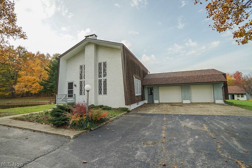 Here is a great opportunity to purchase the ultimate weekend get-a-way or even a new place to call home. Situated on a private setting, this property boasts a 1700 square feet home on 47 acres of very nice land. The main floor of the home has one bedroom, a full bath, living room, spacious kitchen and cozy family room with wood burning fireplace. Upstairs there are 2 additional bedrooms, a full bath and an enclosed patio. There is also a full basement. The beautiful woodwork throughout the home gives a rustic feel. Property features include:

- Paved driveway
- City water service 
- Free natural gas to home for heating and cooking
- 2 car attached garage with new roof
- Outdoor covered patio
- 24' X 32' barn with workshop
- 3 ponds full of fish
- Very nice trails to access the majority of the property
- Over 32 acres of woods
- Gently rolling topography
- Over 5 acres of the property could be fenced for pasture
- Property is located less than 1 mile from I-90
- All of the