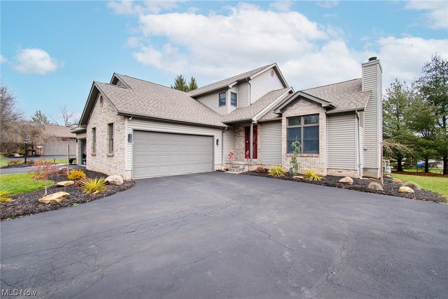 This beautiful updated open-concept floor plan is current and fun. Step into the massive great room and be refreshed that it's not that same old boring floor plan. Vaulted ceilings, beautiful fireplace, open staircase, a large dining room, and an updated kitchen with custom island bar seating and appliances that stay. 1st floor master with whirlpool bathtub, separate shower, vanity, and large walk-in closet. Convenient 1st floor laundry and a half bathroom round out the 1st floor. The 2nd floor has a large open loft with a double closet, perfect for out-of-town guests, kids, or in-home offices. The second bedroom has large closets and a separate full bathroom. This perfect condo also has a finished basement with a bar, two huge storage closets, and an unfinished space as well. There is no need to hunt for parking for you or your guests because you have a 2-car attached garage and private driveway. Private deck, and pets are allowed. 6 units in association newer roof, updated landscaping, newly sealed driveway, updated hot water tank, updated lighting and 12 course basement just to name a few. COME SEE TODAY YOU WILL LOVE THIS HOME.