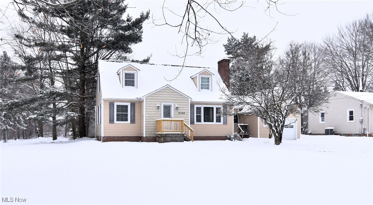 Fabulous four bedroom Cape Cod in Highland Heights. Mayfield City schools! Two bedrooms and a full bath on the first floor. Large living room with a cozy fireplace. Kitchen with tons of storage that opens to dining area with glass doored built ins. Big family room and a finished sun room with skylights that opens to a deck overlooking the backyard. First floor laundry! Upstairs you'll find two more large bedrooms and another full bath. Lots of closets and storage space throughout. Full basement with tons more storage. Attached one car garage. Large backyard with an oversized two bay outbuilding perfect for a workshop and storing all your extra toys. The magnolia tree in the front is stunning when in full bloom. Great location close to schools, hospitals, dining, shopping, and highways. Please enjoy our attached video tour and request your private showing today. Make this wonderful home your own!