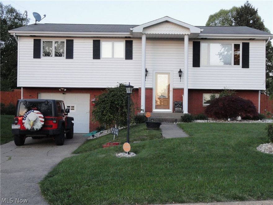 Well maintained 3 BR, 2 Bath home features an updated fully equipped eat in oak kitchen w/solid surface counters, hardwood floor & pass-thru to LR +sliding door access to covered back yard deck, large LR, finished family rm w/gas fireplace, large laundry area & integral garage.  Large level back yard  is very nicely landscaped w/privacy fence, patio, above ground pool w/changing area - great back yard entertainment space.  School w/in walking distance.  Move in ready.