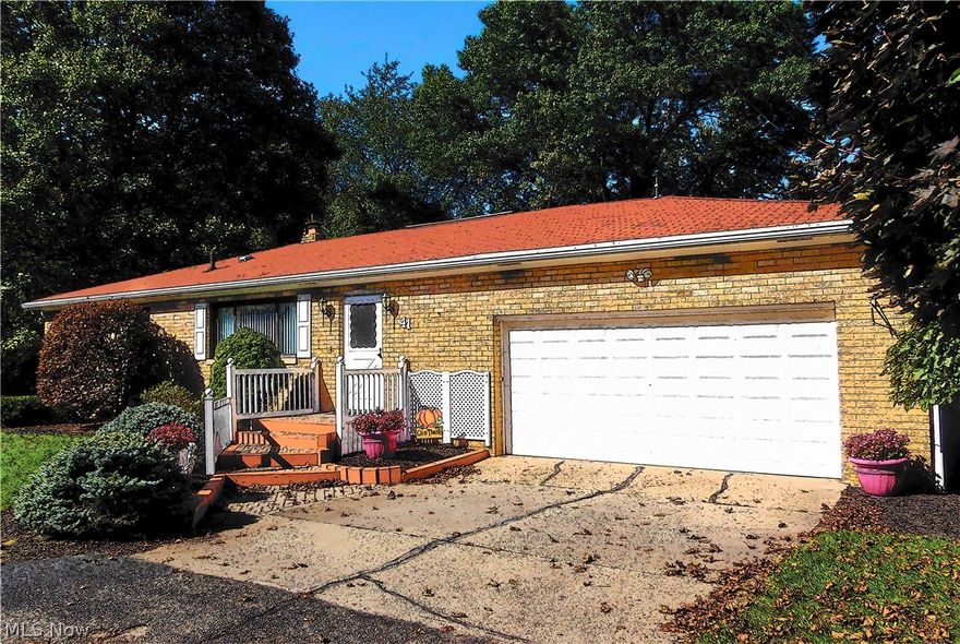 Solid well cared for 4 Bedroom , 3 full & one 1/2 bath BRICK Ranch. Home offers a complete guest/in-law suite in walkout lower level. Beautiful newer year round sun room with fireplace. First floor Laundry room door is behind garage. Laundry hook up in basement as well. Newer windows,High efficient furnace and Central air 2011,Hot water tank 2012.The home also offers a whole house ventilation fan. Hard wood flooring in Living rm.,dining,hall and under carpet main floor.