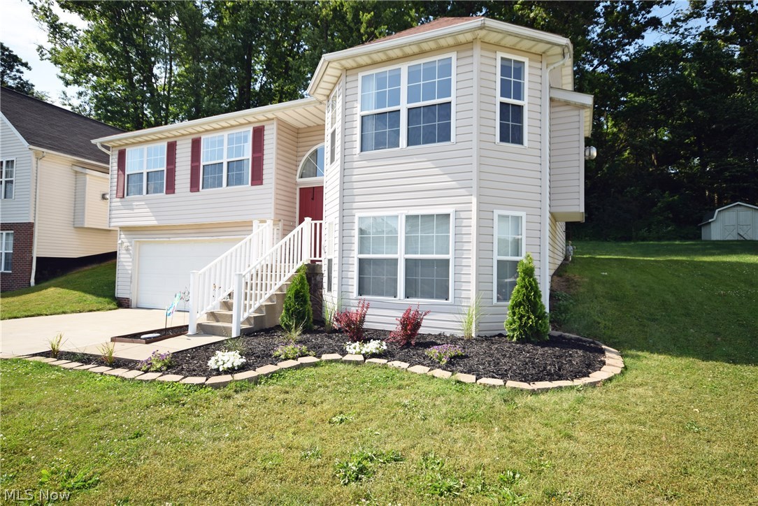 Beautifully done 3 bedroom and 2.5 bath bi-level. Intuitive layout with one floor living. Spacious living room with fireplace open to the dining room with patio door to the backyard. Master bedroom includes master bathroom. Great kitchen with attractive new stainless appliances and tasteful tile counter-tops. Large family room on the lower level with laundry and half bathroom. No worries as this home comes with America's Preferred Home Warranty! Great access to Rt. 224 & Rt. 77/Rt. 8. Don't miss out! Call today to schedule your showing!