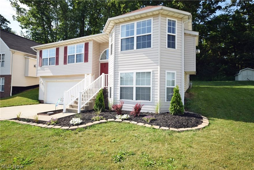 Beautifully done 3 bedroom and 2.5 bath bi-level. Intuitive layout with one floor living. Spacious living room with fireplace open to the dining room with patio door to the backyard. Master bedroom includes master bathroom. Great kitchen with attractive new stainless appliances and tasteful tile counter-tops. Large family room on the lower level with laundry and half bathroom. No worries as this home comes with America's Preferred Home Warranty! Great access to Rt. 224 & Rt. 77/Rt. 8. Don't miss out! Call today to schedule your showing!