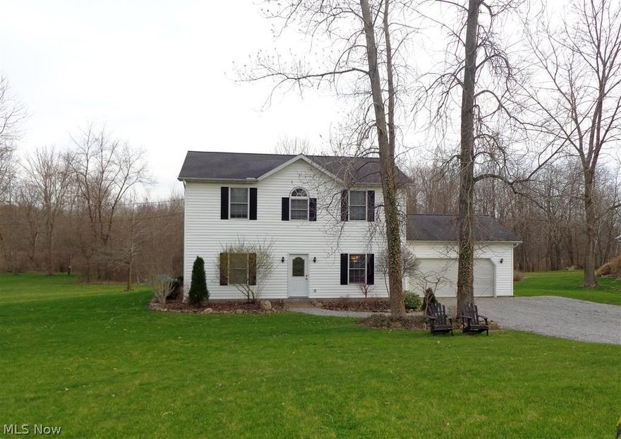 Welcome to 3224 Dawley Rd., Ravenna, Ohio in Ravenna Township. Country living, but with public sewer, and no worries about basement issues.  This 3 BR, 2.5 bath colonial offers an open floor plan, sparkling clean, move-in ready interior, central air, almost 2 acres of land, deck and 2 car garage.  Oh, and did I mention that the mineral rights transfer with the property? Make your appointment today!