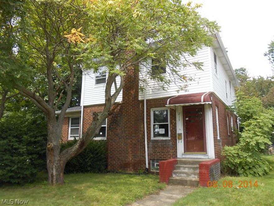 Spacious Colonial brick home in Firestone Park featuring natural wood throughout, large rooms, living room with fireplace and adjacent study, formal dining room, 2 car attached garage, 1 1/2 baths, brick & vinyl exterior and convenient location.  Equal Housing Opportunity.  Sells As Is.