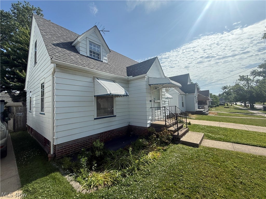 Photo of 12000 Wayland Avenue, Cleveland, OH 44111 (MLS # 5217351)