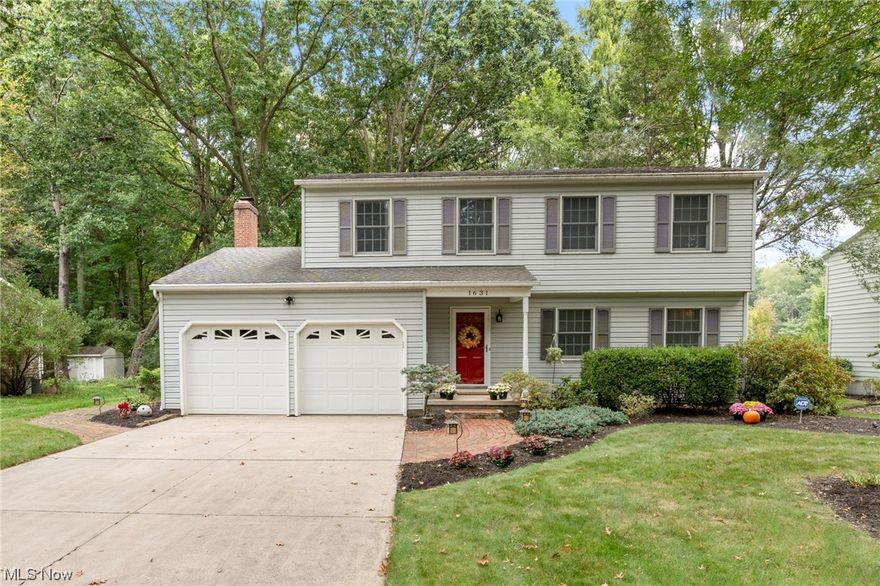 Gorgeously remodeled, 4-bedroom, 3-bath Colonial in Kent, situated upon peaceful, parklike setting in walkable neighborhood. Prime location within minutes of parks, schools, shopping and Kent State University. Quality workmanship is evident… from timeless crown and picture frame moldings… to gleaming hardwood flooring… and the beautiful built-ins that add so much charm and character throughout. Gourmet Kitchen, the heart of the home, is a show stopper. A sweeping expanse of Corian and granite countertops, abundant custom cabinetry, ample task lighting, and stainless steel appliances (cooktop is dual fuel) make meal prep a breeze. Kitchen is open to vaulted Morning Room, with casual seating and Dining Nook, and cozy Family Room anchored with lovely, raised hearth, brick fireplace. It’s an extraordinary living space, as comfortable as it is elegant. The entire open area, bathed in natural light, offers soul-soothing views of nature’s beauty framed by floor-to-ceiling windows. Two sets of sliders provide convenient access to the backyard deck and wrap-around brick walkway for every day enjoyment or easy entertaining. Formal Dining Room, Living Room and Powder Room complete the first floor. Upstairs, you’ll find the Primary Suite with huge walk-in closet, dressing area and private Bath, three additional good-sized Bedrooms, and Hall Bath with skylight. Generous storage on every level. Home warranty included. This wonderful home is a must-see! Schedule your private showing today!