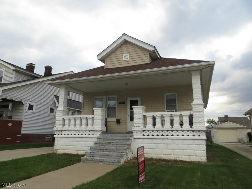 SHORT SALE - Front Porch Ranch Roomy Yet Compact. 9 Ft Ceilings. Hardwood Floors. Living Rm, Informal Dining Rm and Kitchen. Two Bedrooms & Updated Bath w/Shower Stall on 1st Floor. Lower Level offers Partially Finished Basement, Possible 3rd Bedroom w/Closet, Full Bath, Laundry & Storage Rooms. Fenced Yard Too! Renovation Loan would give buyer ability to add a Garage. (Exclude all appliances, oak tree in backyard N.E. corner 4-5' tall 3 diameter tenant to remove)  Buyer to Assume City Violations. Call to View Today.