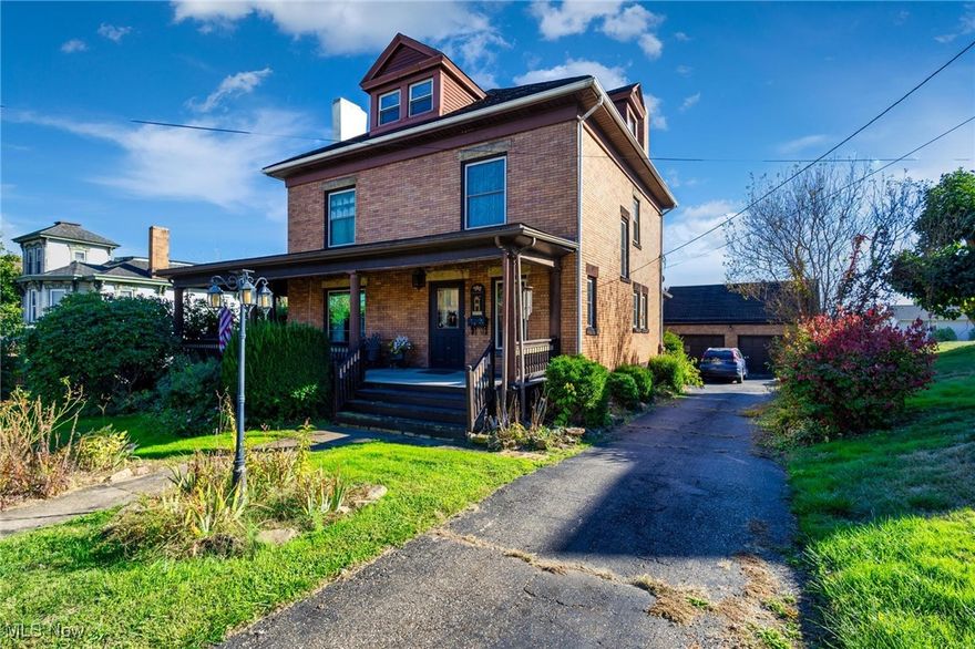 SELLER IS OFFERING A HOME WARRANTY WITH AN ACCEPTABLE OFFER!  *FLAT* BACKYARD !!  MUST SEE GEM! Step back in time with this beautifully preserved century home, radiating Old World charm and craftsmanship throughout. Located right in the center of the beloved Gem City, this rare gem showcases stunning, flawless original woodwork, intricate detailing, and historic character you won’t find in modern builds.  The grand interior features two sets of original pocket doors, a fireplace mantle possibly adorned with rich tiger wood, and a large formal dining room perfect for hosting. The charming kitchen offers tile flooring, a pantry, and a touch of vintage flair, while the butler stairs and main staircase lead you upstairs to three spacious bedrooms and a generously sized full bath.  The finished attic level provides additional versatile space—ideal for storage, a hobby room, or even a fourth bedroom.  Outside, enjoy relaxing evenings on the wrap-around porch or stroll through the park-like yard that adds beauty and serenity to everyday living. A detached 2-car garage offers convenience and extra storage.  This is more than just a house—it's a piece of history lovingly maintained and ready for its next chapter. CALL TODAY!