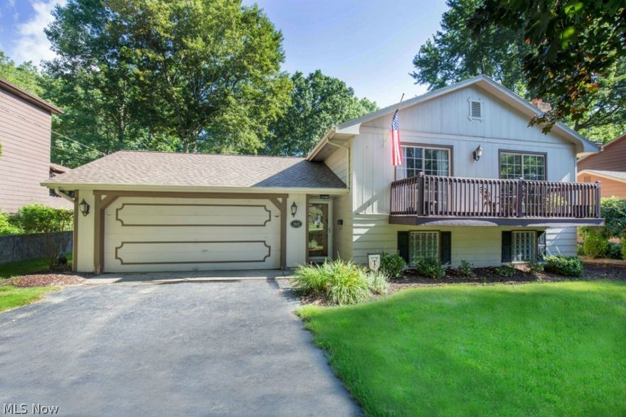 Absolutely Awesome 4 Bedroom/2 Full Bath home with Awesome Private Backyard!  Home Features Include:  First Floor:  Awesome Updated Kitchen with Stainless Steel Appliances & Ceramic Tile Floors, Huge Front Family Room with Hardwood Floors, 3 Large Bedrooms, & Updated Bath.  Lower Level:  Spacious Family Room/4th Bedroom, Huge Rec Room, Laundry Room, & 2nd Full Bath.  Front of home offers an Awesome Terrace Area.  Back Yard is Private, Wooded, & Scenic!  Updates Include:  2010 - New Windows.  2010 - Updated Bathrooms.  2009 - Updated Roof.  Stunning Home!