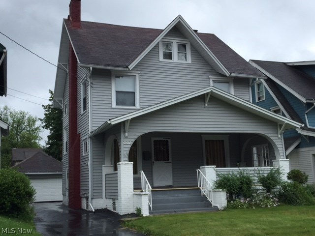 This classic four bedroom, one bath home features a spacious living room with fireplace, formal dining room, eat-in kitchen, basement and garage. Charming house with original woodwork, built-in shelving and window seat. Priced right!