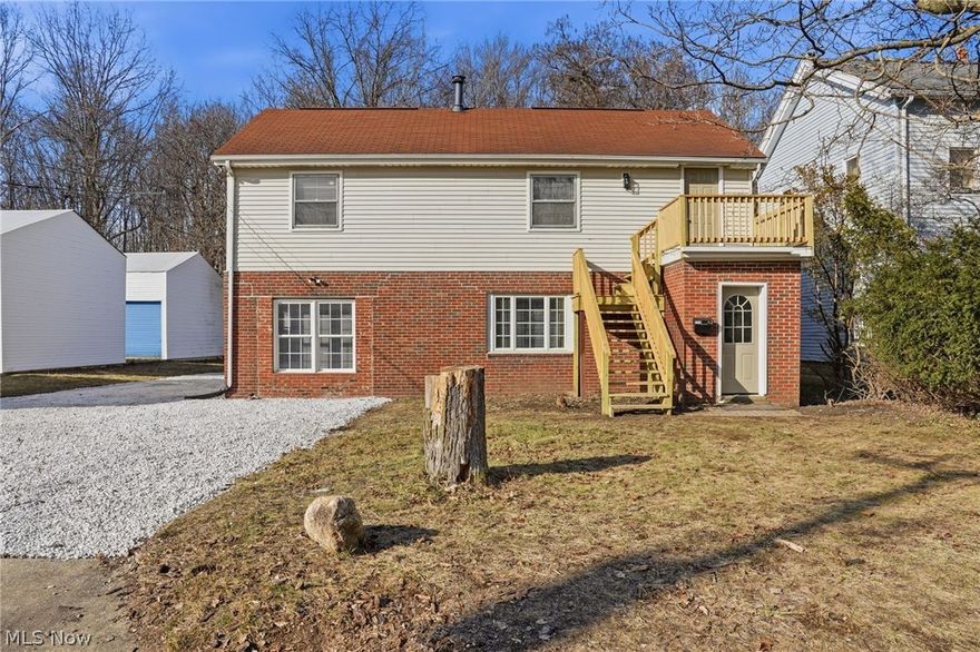 Welcome to this Geneva beauty! this is a fully renovated two-story home located approximately two miles from the Lake Erie shoreline, ten minutes from the Geneva-on-the-Lake resort strip, and only minutes from I-90 for easy access to schools, shopping, and local attractions. Surrounded by popular wineries and close to excellent Lake Erie fishing, this property offers both convenience and lifestyle appeal. The home features four bedrooms and two full baths, including a flexible mother-in-law or teen suite with a full kitchen and an additional kitchenette. Both the kitchen and kitchenette are equipped with all-new stainless steel appliances, complemented by upgraded cabinetry and generous counter space. Interior updates include upgraded LVT flooring throughout, fresh neutral paint, modern lighting, and fully updated fixtures. The bathrooms have been completely remodeled—one with a stylish walk-in shower and the other with a new tub/shower combo—each finished with tasteful vanities, updated sinks, and contemporary fixtures. A full bath and 2 bedrooms on each floor provide convenience and privacy, and the large bonus room on the 2nd floor would be a great 5th bedroom or entertainment area. Exterior improvements include updated siding, a freshly stoned driveway, a front and back deck, and a detached garage offering ample space for storage or a workshop. With all utilities updated and every detail refreshed, this move-in-ready home stands out as an exceptional opportunity in the heart of Geneva.