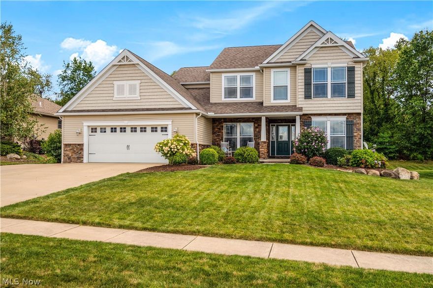 THIS IS IT! Look no further. This beautiful 6 bedroom, 3.5 bath, 2 story home is situated on a quiet street in desirable Lake Local Schools. Walk into the welcoming foyer and notice the attention to detail and open floor plan. The great room has a stone gas fireplace with windows over looking the professionally landscaped backyard. The eat-in kitchen has plenty of cabinetry with new quartz countertops & large island w/breakfast bar. Wood floors throughout the kitchen, foyer & vaulted sunroom. A mudroom (perfect for those bookbags & shoes) is located off the kitchen towards the garage. 1st floor office and dining as well. The 2nd floor hosts the master suite with large master bath & walk in closet. 2nd floor laundry & 3 additional bedrooms and a full bath round out this floor! 
This home has flexible living & entertainment options with a fully finished lower level (1,066 sq. feet) complete with 2 additional bedrooms, kitchenette, rec room, full bath, and second laundry room! Enjoy outd