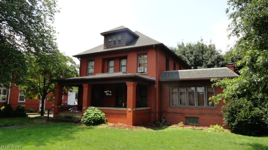 Beautiful 4 bedroom, 2 bath brick 2 story.  Inviting covered front porch leads to the spacious tile foyer.  Pocket doors to the living room.  Quaint breakfast nook just off the kitchen.  Ceramic tile gas fireplace in the first floor family room.  Jacuzzi tub in the first floor bath.  Formal dining room.  Partially fenced backyard with alley access.  Excellent North Dover location.