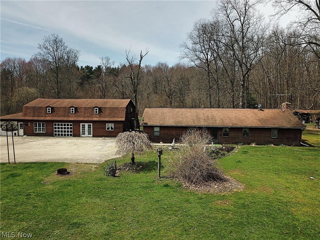 Incredible opportunity with 57+ acres in Burton Township. The main house features 4 bedrooms and 2 full bathrooms, Family Room, Dining Room and Living Room with stone fireplace and a slider to the spacious backyard. The Barn/Garage has an in-law/teen suite complete with its own Kitchen, Full Bathroom, Bedroom, Living Room and Family Room with a wood burner and an attached parking area with heated workshop area. The top of the garage has a large recreational room along with a full bathroom and additional space for an office/playroom or bedroom. The private backyard has an oversized storage shed and a screened-in Gazebo with a built in grill. The Gas Well to the south of the property feeds the house. The property was once part of a campground and some of the structures used still remain. Mature trees throughout. Berkshire Local School District. 1 year House Home Warranty. All interested parties must make an appointment to see the property, DO NOT walk the property without an a