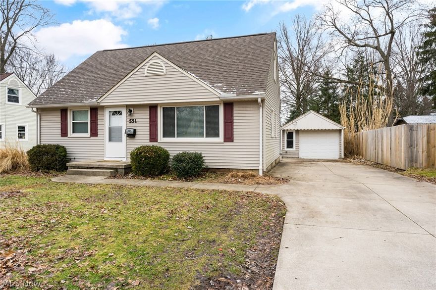 Charming three bedroom Cape with an efficiency apartment that has a separate private entrance. With lovely curb this home has been maintained in excellent condition throughout. Sparkling clean eat in  kitchen has updated cabinets, counters,sink, backsplash, floors and a new dishwasher. Living room and kitchen have  large windows welcoming the natural light. Living room  and bedrooms have  refinished hardwood floors. Master bedroom has  new carpet and a private master bathroom. The lower level efficiency apartment has a full kitchen,full bath and enough room to comfortably accommodate  a queen size bed and couch. Plus there is a large  storage/laundry area in the basement.  All  three bathrooms are in updated condition as well. There is a nice sized fenced yard, a single car garage and a large wide concrete driveway. Situated on a lovely street within .03 miles to  Kent State University. Home warranty included.