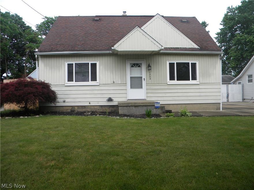 Beautiful move in ready 3/4 bedroom cape in North Akron.  Kraftmaid cabinets in the kitchen with pullout shelves and tile flooring.  Full bathroom has a tiled shower all the way to the ceiling and vent fan.  Finished basement with rec room and one bedroom.  Two car detached garage with a large fenced in yard and stoned patio for your summer BBQ's.  Call to schedule a showing today.