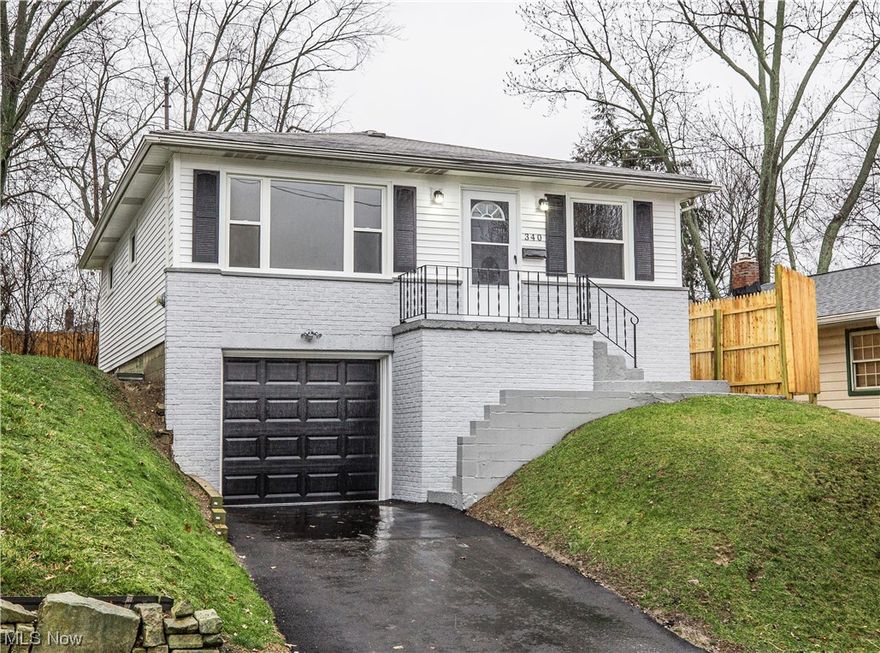 Welcome home to this totally renovated 3-bedroom, 1-bath ranch located in the heart of Ellet. This property boasts tons of recent upgrades including new vinyl siding, replacement windows, privacy fence, garage door (1-car attached) and asphalt driveway on the exterior. Inside you will find a brand-new eat-in kitchen with all stainless appliances, completely remodeled bathroom, flooring and fresh paint throughout while the clean and dry basement with glass block windows provides valuable additional space. For peace of mind you'll also notice a newer furnace, updated plumbing and new electric panel. Don't wait to call this house your home! Nothing to do but get groceries and move right in! Call your favorite Realtor to schedule your showing today!