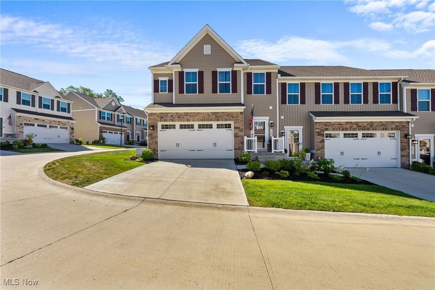 Stunning 2023 built townhome in the Hillshire Woods Development in Concord Twp! This spacious 4 bedroom, 3.5 bath home offers over 2,500 sq ft of finished living space, including a fully finished basement – ideal for multi-generational living or guests. The main level features a bright, open floor plan with a large living room, upgraded kitchen with stone countertops, stainless steel appliances (included), pantry and a dining area with slider to the 12x12 composite deck and stamped concrete patio. A perfect space for outdoor entertaining. Entry foyer with half bath and attached 2 car garage with epoxied floor and extra storage. Upstairs, you’ll find a luxurious primary suite with two walk-in closets and custom tiled shower, two additional bedrooms, full bath, convenient laundry and a loft area, ideal for an office nook. The finished basement includes a large rec room, 4th bedroom with egress and a full bath! Move-in ready, better than new and packed with upgrades, this one has it all! Schedule your showing today!
