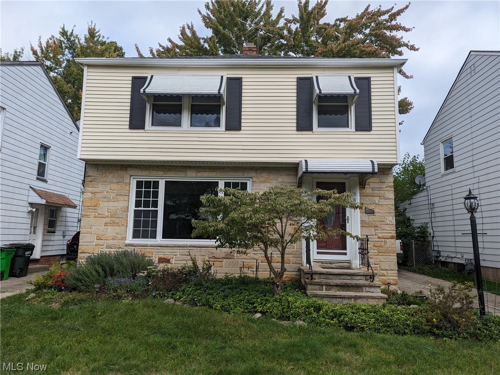 Beautiful stone front 3 bedroom, 1.5 half bath Colonial conveniently located in South Euclid. This amazing home has been updated throughout. The spacious eat-in kitchen has updated cabinets with new granite countertops (Aug 2023) and newer appliances. Enjoy entertaining in the large living rm /dining rm with built-ins and huge picture window. Enjoy cozy nights in your 4 season room that leads out to the backyard. The upstairs full bath has been updated with new flooring, finished tub, tile, vanity and light (Aug 2023). All the floors in the spacious bedrooms, living and dining rooms have been refinished. The partially finished lower level has new laminate flooring and loads of storage (Aug 2023). Newer windows, doors, and roof. Freshly painted throughout with new carpet up the stairs and landing (Aug 2023). Newer A/C, furnace, and hot water tank. Partially fenced in backyard rounds out this turnkey home. This home is minutes to downtown, Notre Dame, shopping, and more. POS completed. A