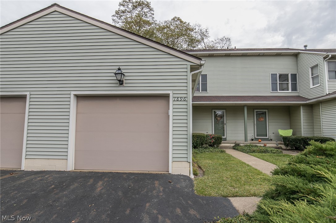 A wonderful 2 bed, 2 full bath townhouse/condo in Stow. With over 1900 square feet of living space, this unit is set up to fulfill all of your needs. The kitchen has Corian Countertops, and opens to 2 story dining. There is a large 21x14 living room, as well as a finished basement for a family room or rec room. Each bedroom is large, and there is an 11x7 loft area. There is an attached garage, additional parking, a laundry area, and so much more.