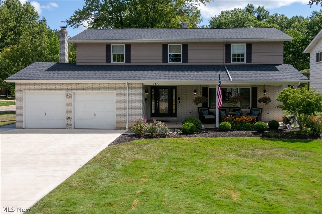 Welcome Home to 3857 Woodpark Lane. This updated and renovated 4 bedroom 2 1/2 bath colonial is ready for you to move right in! From the moment you walk through the front door you will love the modern colors and flow of the home. Beautiful solid bamboo floors in the front great room. The gourmet eat in kitchen features granite countertops, maple cabinets, solid bamboo floors, a 10 ft island, and a garden window. This kitchen is perfect for entertaining or just dining with family. The kitchen opens to the family room which boasts a granite stone wall fireplace with ventless gas logs, a new laminate floor, and an updated 1/2 bath. Moving upstairs you will find four spacious bedrooms. The large master bedroom has hardwood floors, a walk in closet, and private walkout porch. The gorgeous master bath has custom built cabinets, corian countertops, heated tile floors, and shower jets. 3 additional spacious bedrooms share a second full bath with custom built cabinets and corian countertops. Th