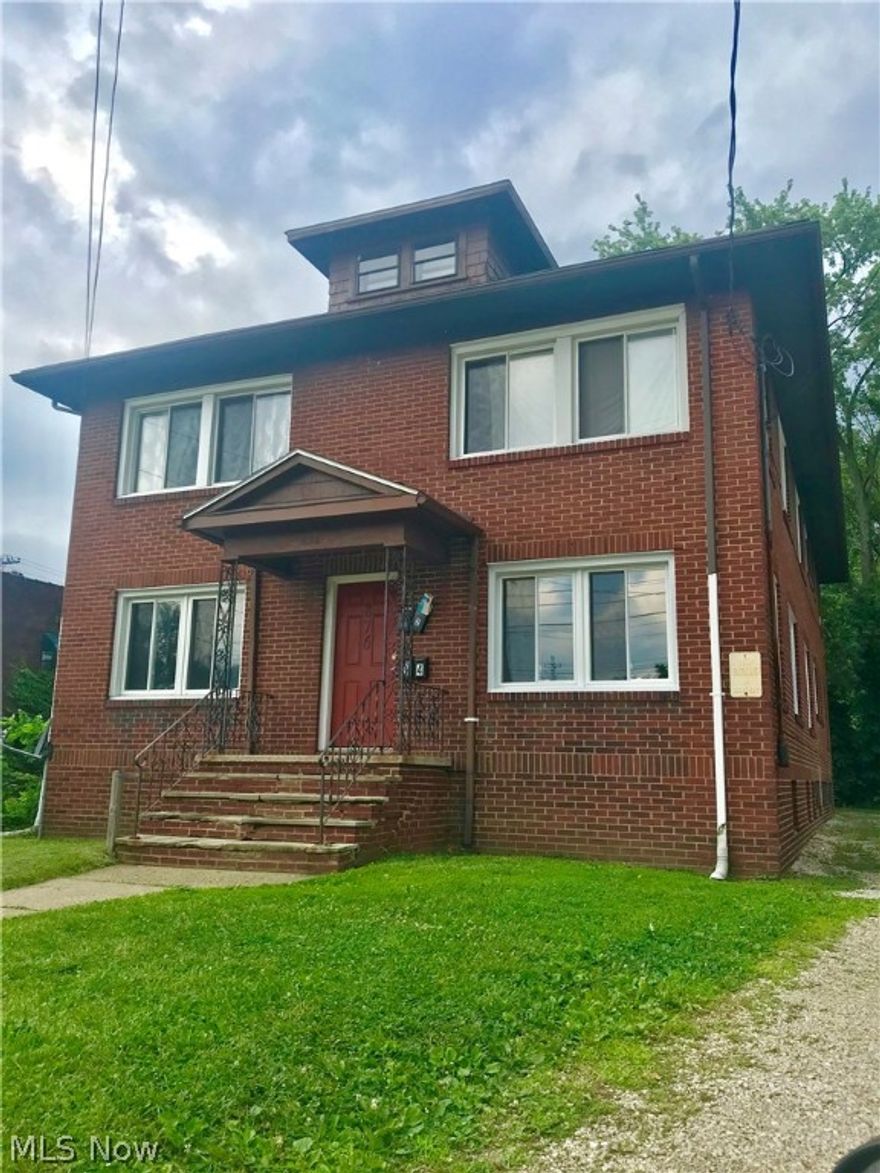 Investor Special!  This income-producing 4 unit property currently has 3 occupied units bringing in $600, $500, and $598 per month. Tenants pay gas and electric. Each unit has 2 beds and 1 bath.  All new windows and 2 hot water tanks within the last 2 years. Appliances to stay.  Vacant unit is in the process of getting renovated.  Minutes from downtown Akron and I-77. There is not a for sale sign in the yard.