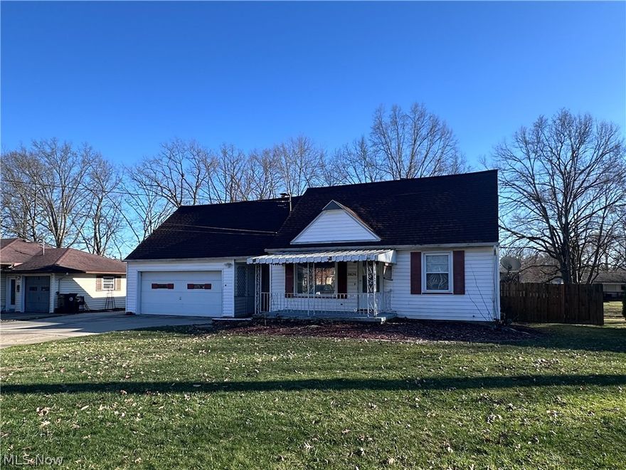 Welcome to 3824 Valacamp Avenue! This cute 3-bedroom, 2-full bath Cape Cod offers charm, functionality and thoughtful updates, all in the Howland school district. Hardwood floors highlight the inviting living room, while the eat-in kitchen features a breakfast bar, ample cabinet space and included appliances. Two comfortable first-floor bedrooms and a full bath provide comfort and convenience. Upstairs, you'll find a spacious third bedroom along with plenty of closet and storage space. The full basement adds even more versatility with an extra full bathroom and a dedicated laundry area. Outside, the attached two-car garage includes a heater and a workshop at the back, complete with a garage door leading to the fully fenced backyard. It's ideal for easy lawn care, outdoor furniture storage or hobby space. Other highlights include central air, an extended driveway for additional parking, a covered front porch and a practical side entrance. Major updates include the roof, gutters and electrical box, all approximately 10 years old or newer.