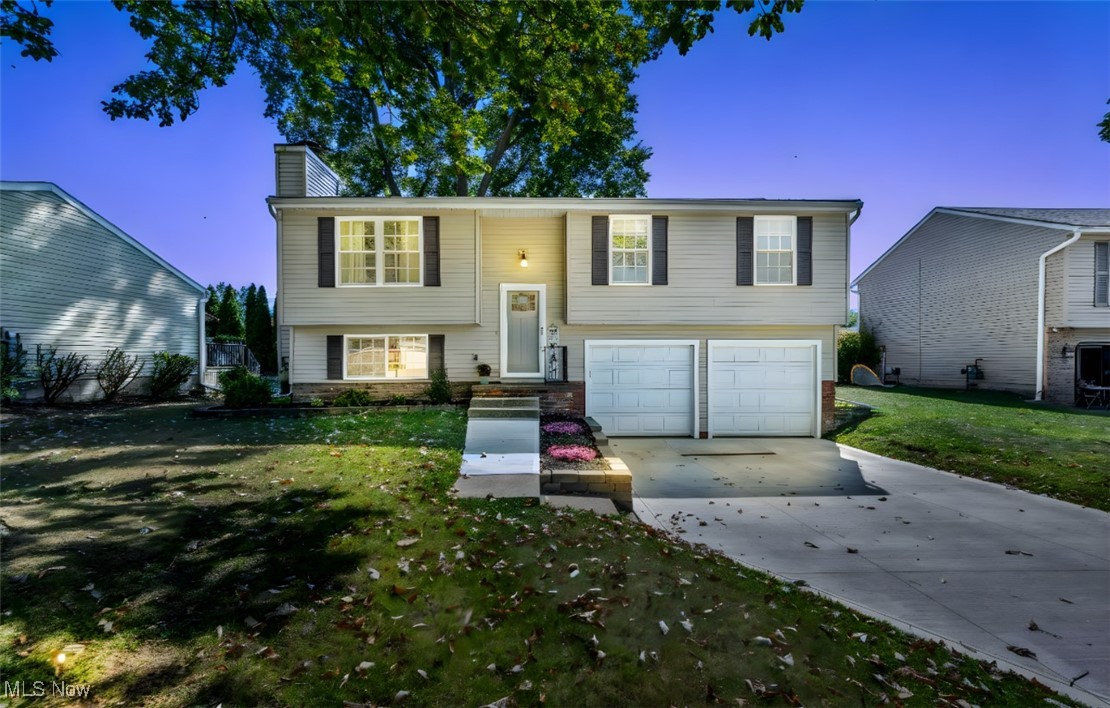 Completely remodeled Willoughby home, just move in and enjoy. 3 bedrooms and 2 full baths. Beautifully updated kitchen with granite and subway tile backsplash. Complete with island and eat-in kitchen. Kitchen opens to expansive back deck for outdoor entertaining. Living room is open to kitchen. Lower level offers a beautifully appointed family room with fireplace, full bath and utility room. Three spacious bedrooms with upper level remodeled bath. Gorgeous hardwood floors, and carpet has been updated. Brand new driveway. Plenty of storage in the two car attached garage and shed. This home is situated on a quiet cul-de-sac. This house has it all!
