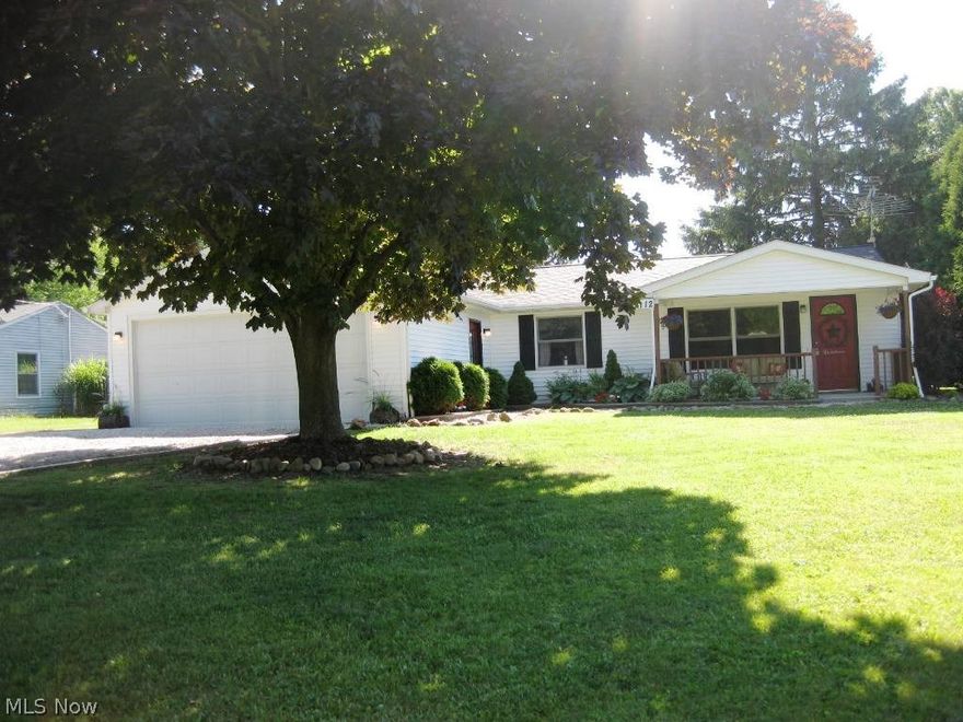 Just the home you've been waiting for! Situated on over 1/2 acre home site, this well kept ranch offers 3 bedrooms, 1 1/2 remodeled baths, eat-in remodeled kitchen with wood floors, comfortable living room with newer carpet, inviting family room with wood burning fireplace, quaint front porch, attached 2 car garage, newer furnace & water tank, newer roof, plus more!