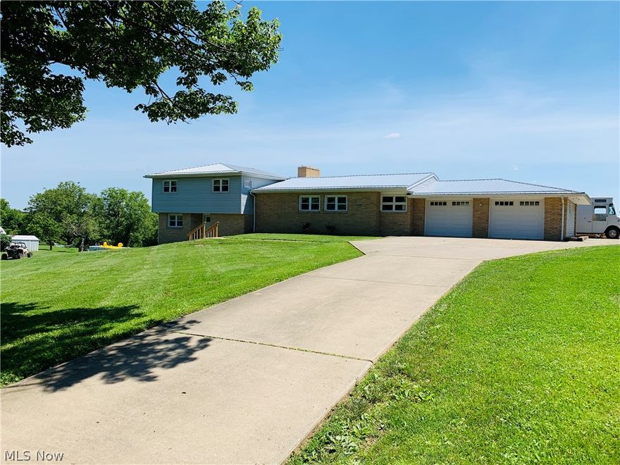 Exquisite open concept home, on a sprawling 1.2 acre lot. This home boasts pride of ownership, with updates to the nines. On the main floor you will find a humongous kitchen with custom counters. This kitchen features stainless steel appliances, new cabinetry, and a breakfast bar. Off the kitchen you will find charming French doors to the lower level, a fabulous dining area with fireplace, a cozy living room, and a large bay window with breathtaking views. On the upper level you will find two tranquil bedrooms with hard wood floors and a marvelous bathroom. Also on the upper level there is an owners retreat with an icy en-suite. Then onto our Lower level you will find an amazing rec-room with a fireplace and walk out patios. You will also find your FOURTH bedroom, and yet another completed updated bathroom with a walk in shower. You can also find a large utility room with tile floors. But wait, there's more, you also have a basement with new hot water tank, furnace, ductwork, and elect