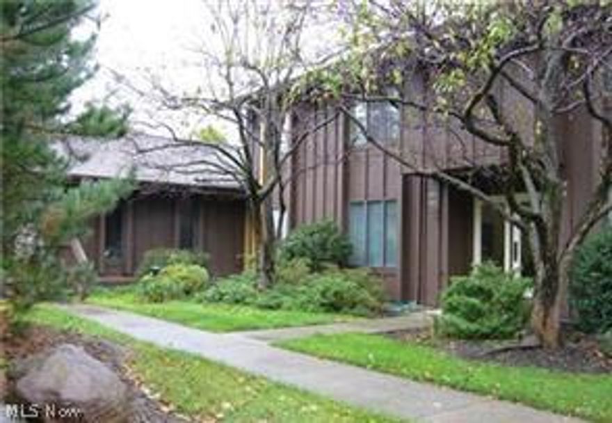 Move right into this beautiful end unit updated condo on first floor. Features include garage parking, in suite laundry, granite counters, cherry Kraft Maid cabinets and newer appliances(09) in kitchen. The bath features a vessel sink, granite counter tops, newer cherry cabinets, a jetted tub, ceramic tiled shower and floor. The spacious master bedroom features two large closets with extra shelving, Pergo flooring and light sconces on either side of the bed. There is also Pergo flooring throughout the entire living area. All appliances are included. Large room sizes. Walk to the pool and park. Located near bike trail.  FHA approved! Must see!