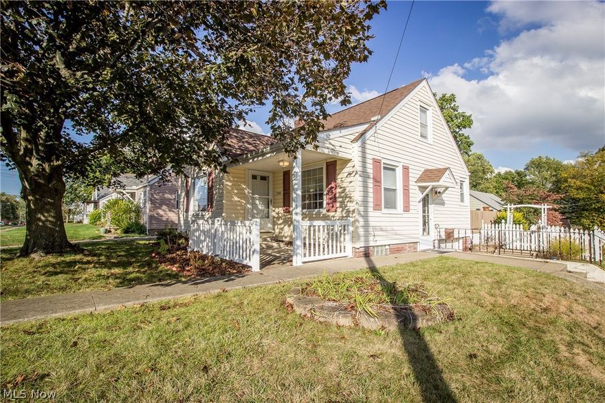 ADORABLE COLONIAL HEIGHTS BUNGALOW ON A CORNER LOT!  This home is nicely updated and picture-perfect featuring a living room with corner fireplace that opens to the dining room.  The remodeled kitchen has newer oak cabinets, mosaic tile backsplash, vinyl floor and stainless steel appliances.  Just off of the kitchen, you'll find a fantastic 3 season sun room with tile floor and sliding door access to the deck and fenced backyard!  There's one bedroom on the main level with easy access to the updated full bath with newer tub, shower surround, and vinyl floor.  The master bedroom is upstairs and offers two closets for tons of storage space.  Even more storage is available in the unfinished basement with laundry area and access to the attached garage.  Updates include kitchen remodel 2013, bathroom remodel, sun room addition and deck 2002, siding, roof, furnace and A/C within the last 10 years~all dates are approximate.  Whether you're looking for your 1st home or ready to downsize, this